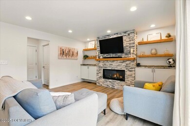 Living Area w/ Custom Fireplace Wall