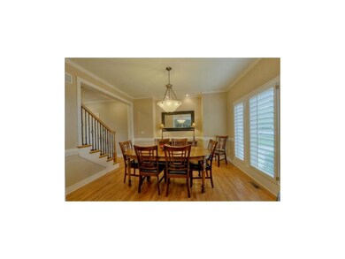 Formal dining room with newly added hardwood floor