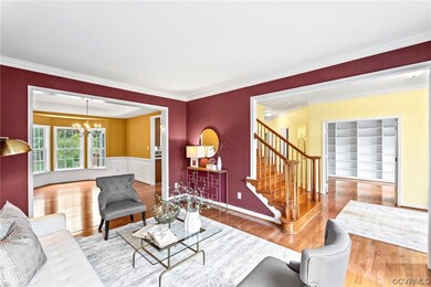 Hardwoods, Crown Molding, Open to Foyer & Dining R