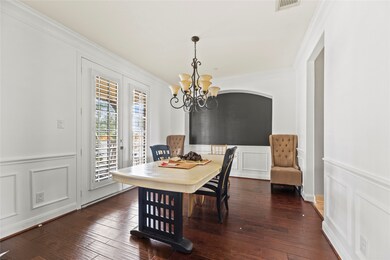Formal dining room with front porch access.