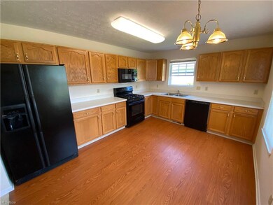 The Eat-In Kitchen has room for everyone. Sleek bl