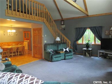 Great Room. THE GREAT ROOM OFFERS EXPOSED BEAMS AN