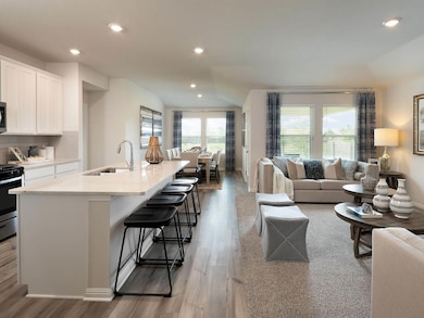 Kitchen with stainless steel appliances, a sink, 