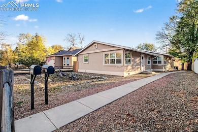 View of front of home featuring stucco siding