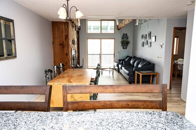 Kitchen, Dining and Living Room with Sliders to Deck