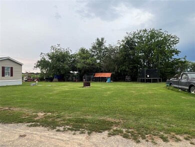 View of yard featuring a trampoline
