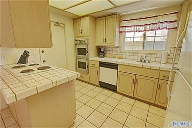 Kitchen with a view of the sink and dishwasher.