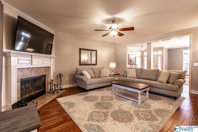 The family room with a wood burning fireplace.