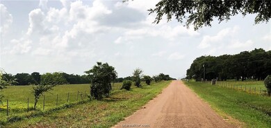 View down Hickory loop looking North.  Property is