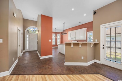Kitchen featuring a notable chandelier, a kitchen 