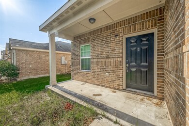 SPACIOUS COVERED PORCH AND HANDSOME PANELED FRONT