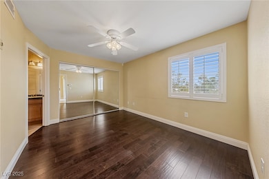 Unfurnished bedroom featuring hardwood / wood-styl