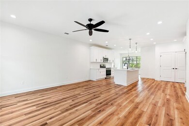 Living area/kitchen. Open concept.