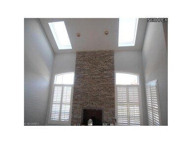 Family Room with Walls of Windows, Skylights, and 