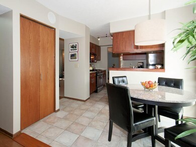 Entering the home, the eat-in kitchen is to the ri