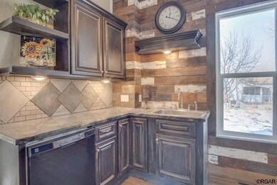 Open Shelving and Feature Wood Wall in Kitchen