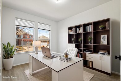 Office space featuring light wood-type flooring