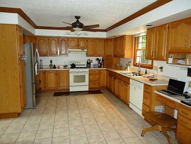 Kitchen. Large EIK has plenty of oak cabinets for 