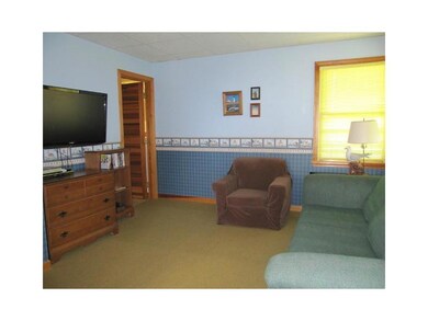 Den. VIEW 2, LOOKING TOWARD TV & BATH