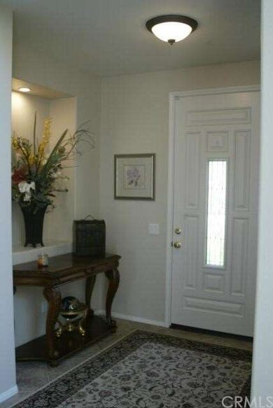 Entry was with lighted display shelfs.