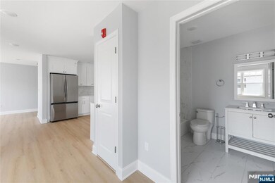 Full Bath Near Kitchen and Bedrooms