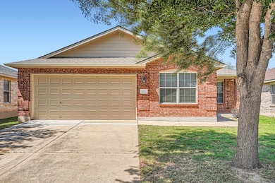 View of front of house featuring brick siding, co