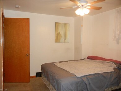 First floor bedroom with half bath