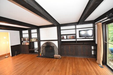 Double sided fireplace goes through to Living Room
