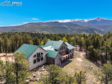 Birds eye view of property with Pikes Peak View