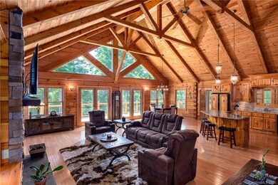 Expansive Windows in Spacious Vaulted Living Room 