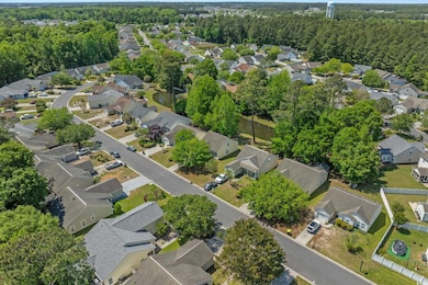Aerial view featuring a residential view and a woo