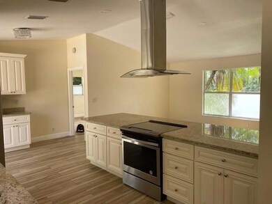 kitchen other with window view to rear