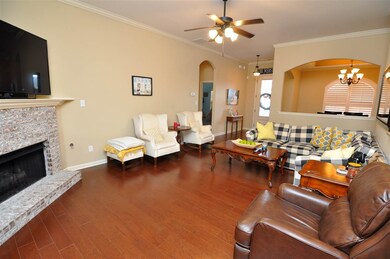 The great room comes with high ceilings with fan, 