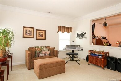 Cut outs divide living from family room space and plenty of windows create a light and bright home!