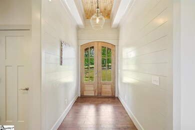 The shiplap walls and extensive trim makes for a w