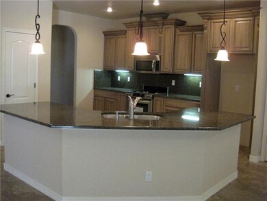 Stylish kitchen with pendant and recesse
