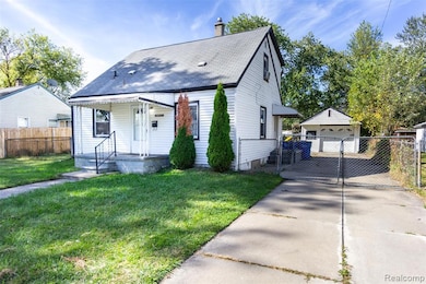 View of front facade featuring an outdoor structure, a gate, a detached garage, a chimney, and roof with shingles
