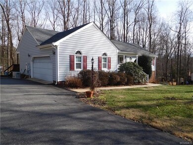 Side view with 2 car garage
