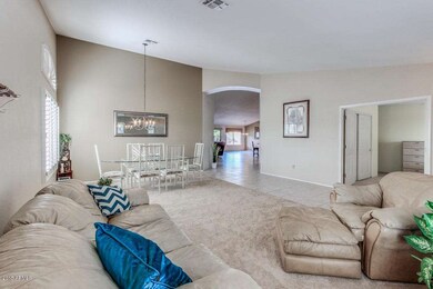 LIVING ROOM AND FORMAL DINING ROOM AREA