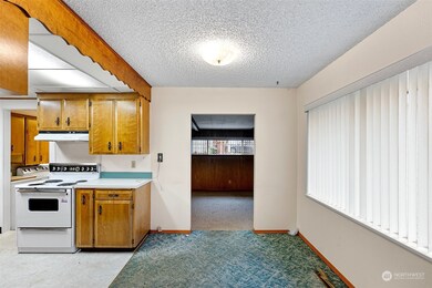 Small dining area right off the kitchen and next to the bonus room.