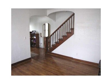 Living Room. Notice the arched openings in the liv