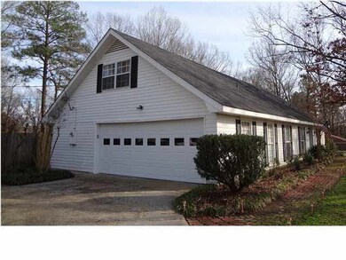 2 car garage and extra parking pad.