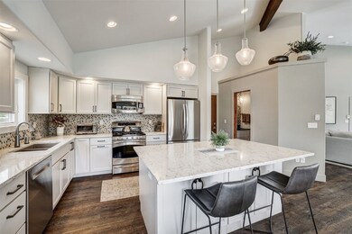 Kitchen with appliances with stainless steel finis
