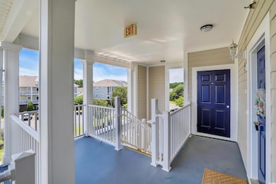 Entrance to property featuring a residential view