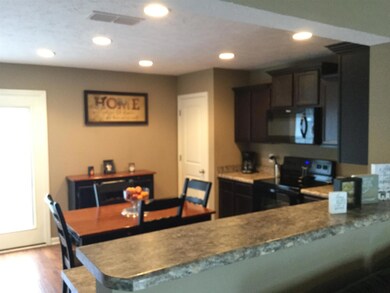 Convenient counter space ideal for bar stools. 