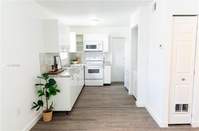 Open concept living, dining & kitchen