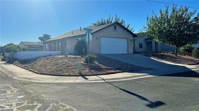 Ranch-style house featuring a garage