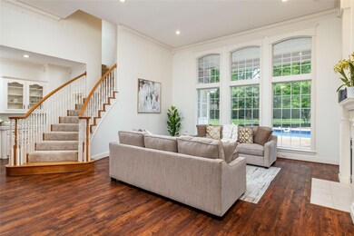 Formal living room, with beautiful view of backyard oasis!