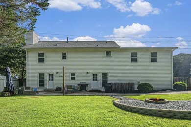 Large, Flat Backyard With A Patio, Firepit, & Privacy Fence