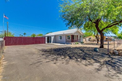 LARGE PAVED DRIVEWAY/PARKING